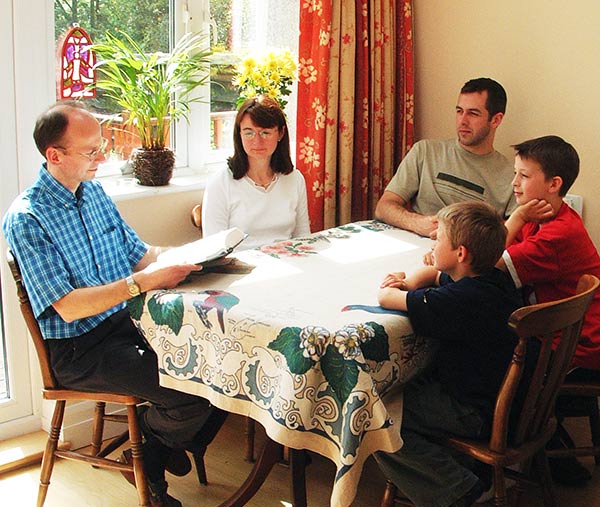 family reading bible together